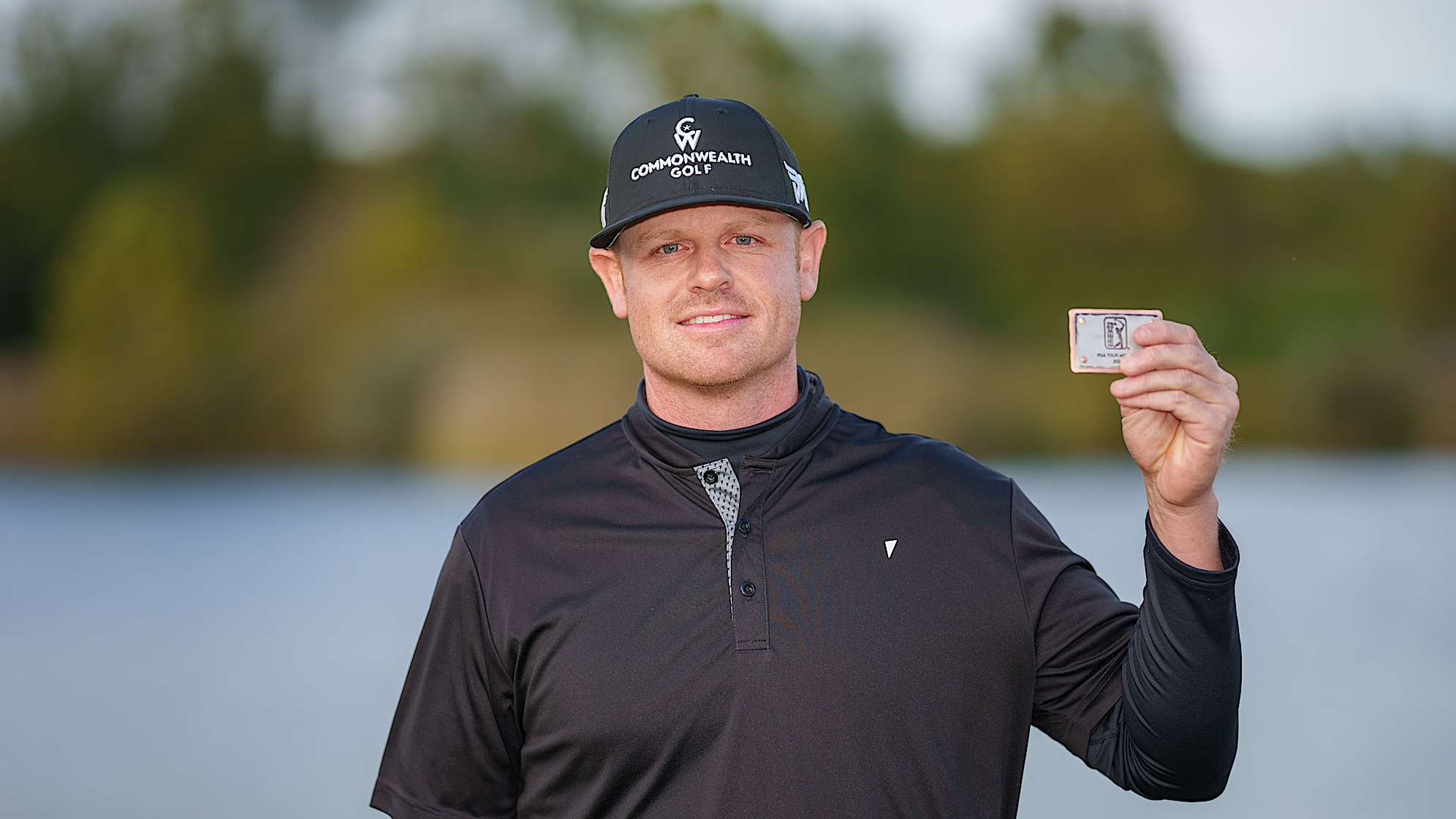 NEWBURGH, INDIANA - OCTOBER 08: Patrick Fishburn of the United States poses for a photo with his PGA TOUR card after the final round of the Korn Ferry Tour Championship presented by United Leasing and Finance at Victoria National Golf Club on October 8, 2023 in Newburgh, Indiana. (Photo by Andrew Wevers/PGA TOUR)