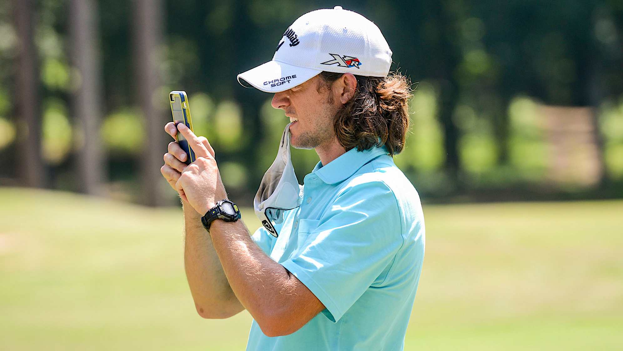 PROSPERITY, SC - MAY 24:  George Bryan IV takes video of his brother Wesley while playing at Mid Carolina Club on May 24, 2016 in Prosperity, South Carolina. (Photo by Keyur Khamar/PGA TOUR)