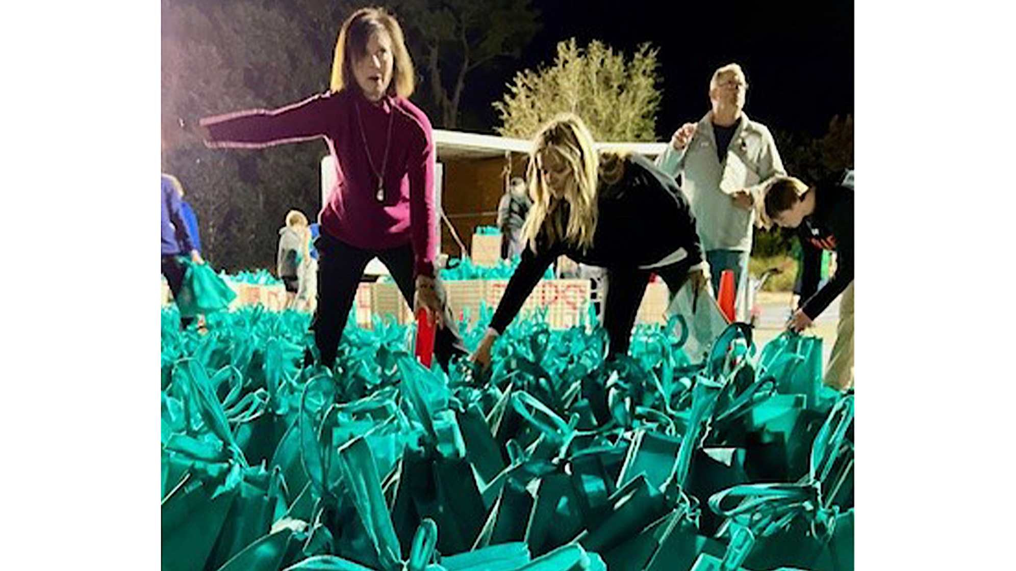 Community members packing bags at the Jim & Tabitha Furyk Foundation annual "Hope for the Holidays" event. (Photos courtesy the Jim & Tabitha Furyk Foundation)