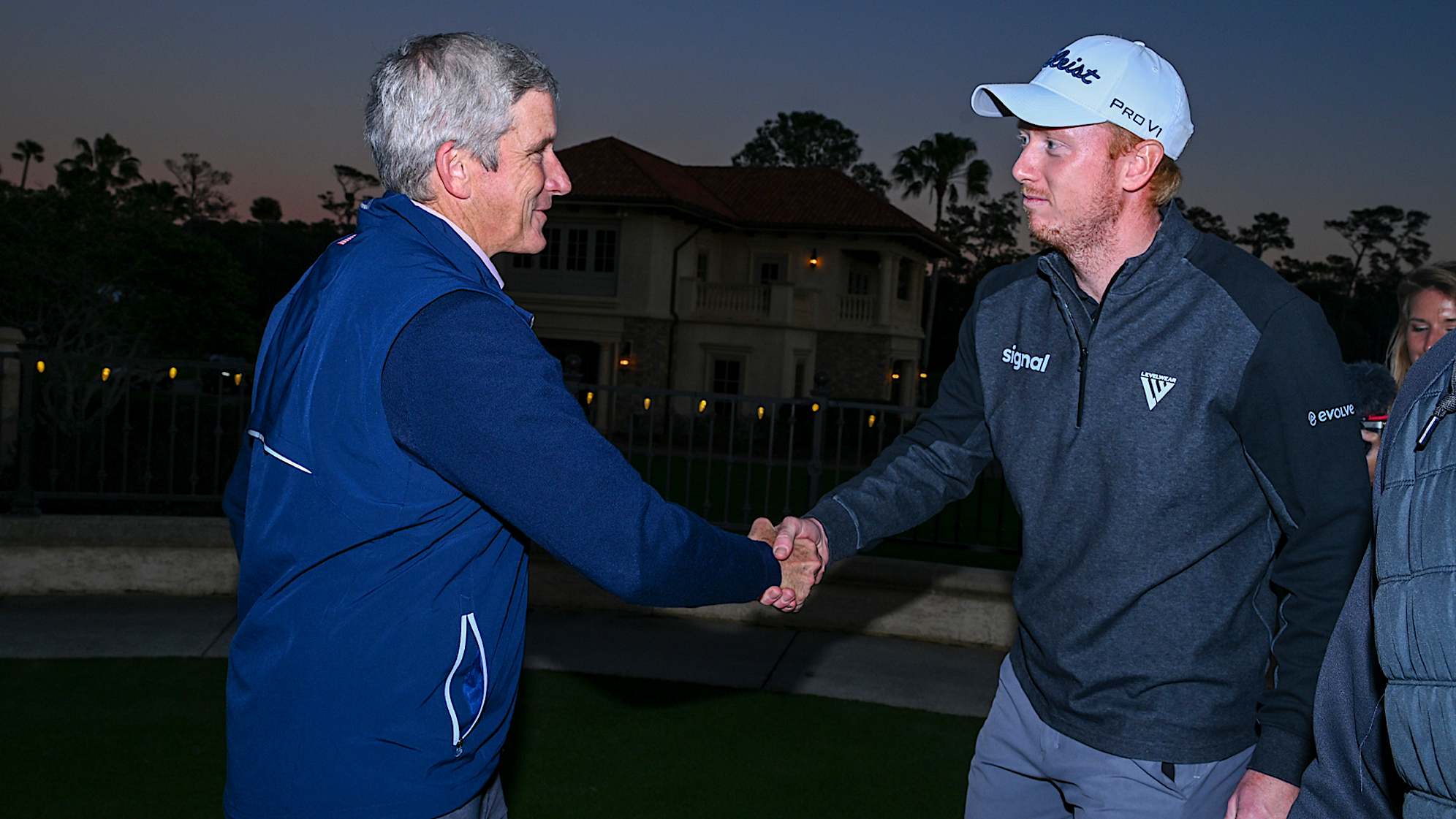 Hayden Springer is congratulated by PGA TOUR Commissioner Jay Monahan after earning his PGA TOUR card. (Tracy Wilcox/PGA TOUR)