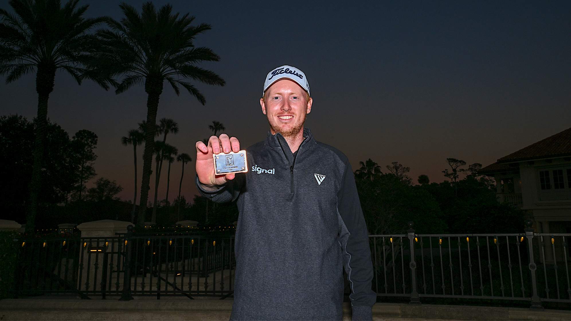 Hayden Springer poses with his PGA TOUR card after the final round of the PGA TOUR Q-School presented by Korn Ferry. (Tracy Wilcox/PGA TOUR via Getty Images)
