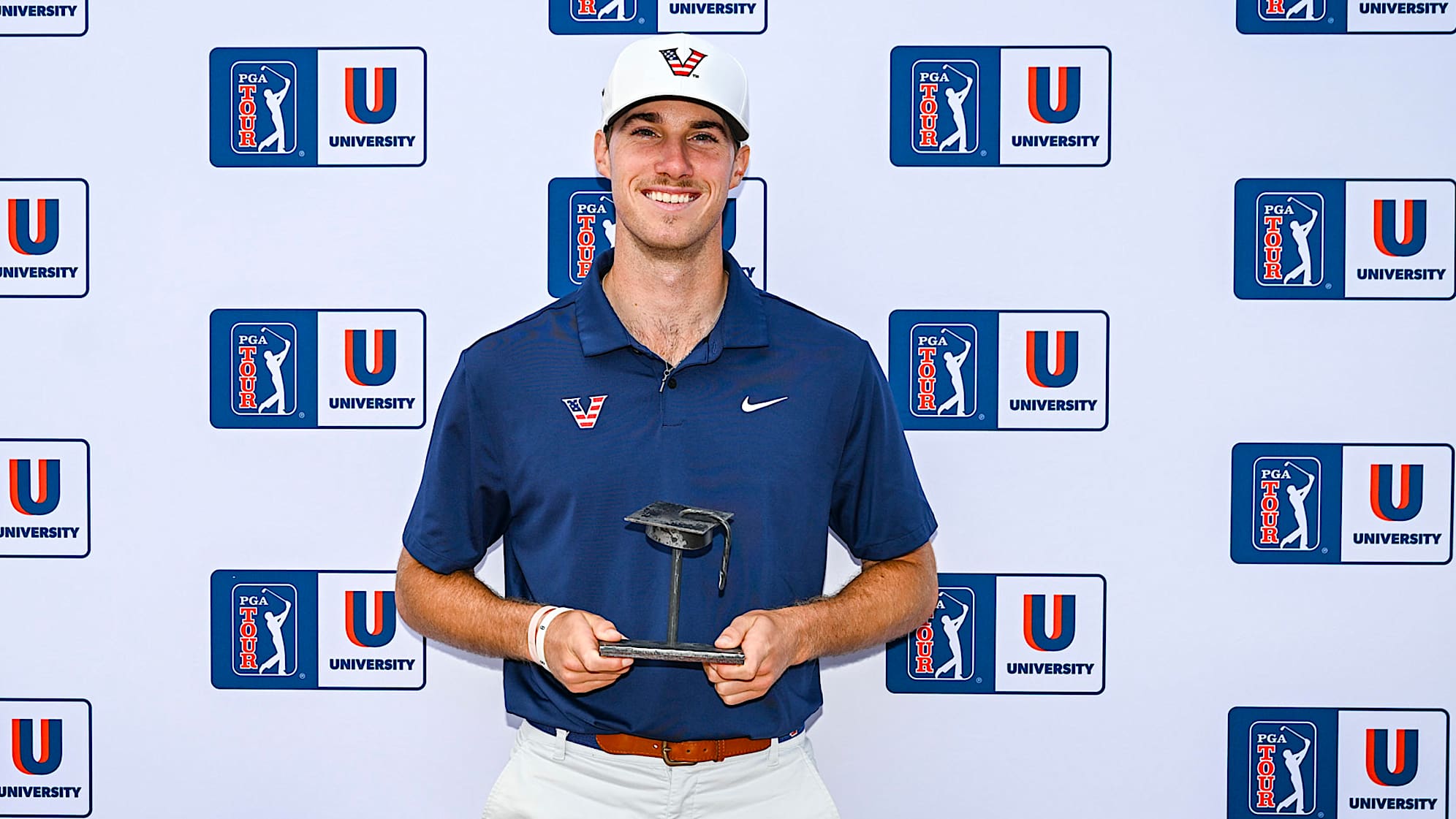 Matthew Riedel of Vanderbilt University smiles with a trophy after finishing fourth in the PGA TOUR University rankings, securing him fully exempt Korn Ferry Tour membership for the remainder of the 2024 season during the NCAA D1 Men’s Golf Championship on the North Course at the Omni La Costa Resort & Spa on May 27, 2024 in Carlsbad, California. (Keyur Khamar/PGA TOUR)