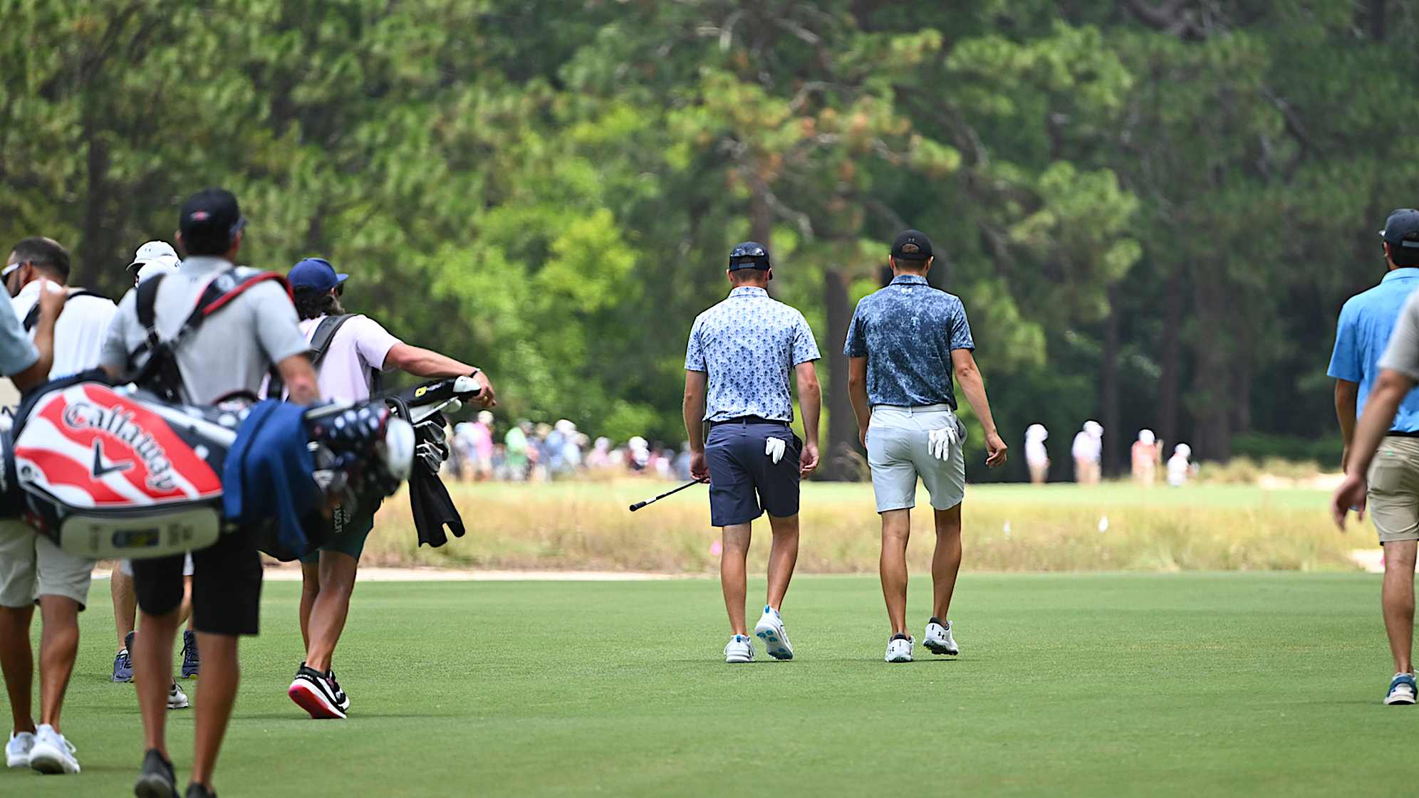 Colin Prater (L) plays a practice round with Jordan Spieth (R) ahead of the 2024 U.S. Open. (Getty Images)