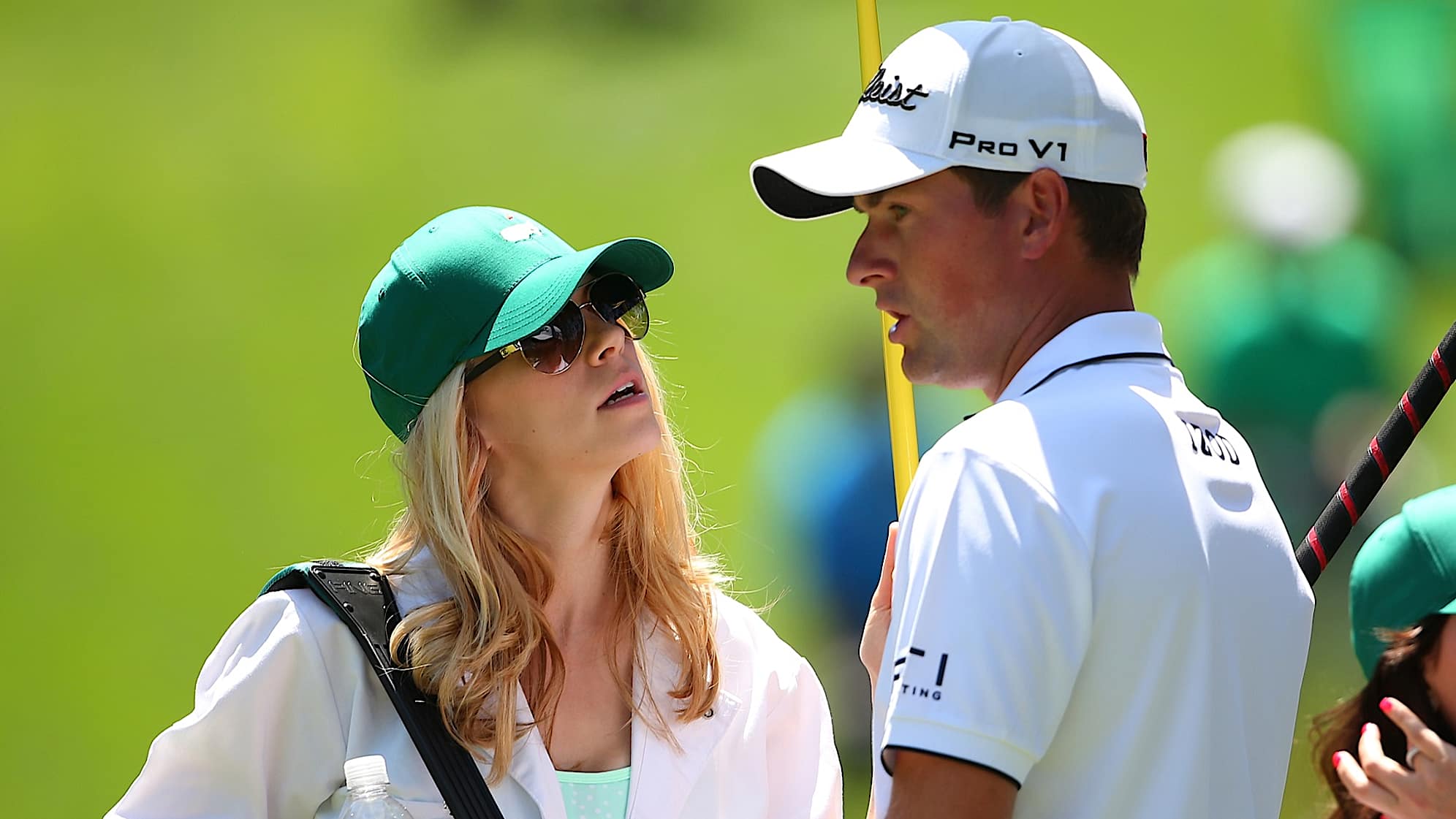 AUGUSTA, GA - APRIL 10:  Webb Simpson of the United States speaks with his wife Dowd Simpson during the Par 3 Contest prior to the start of the 2013 Masters Tournament at Augusta National Golf Club on April 10, 2013 in Augusta, Georgia.  (Photo by Mike Ehrmann/Getty Images)