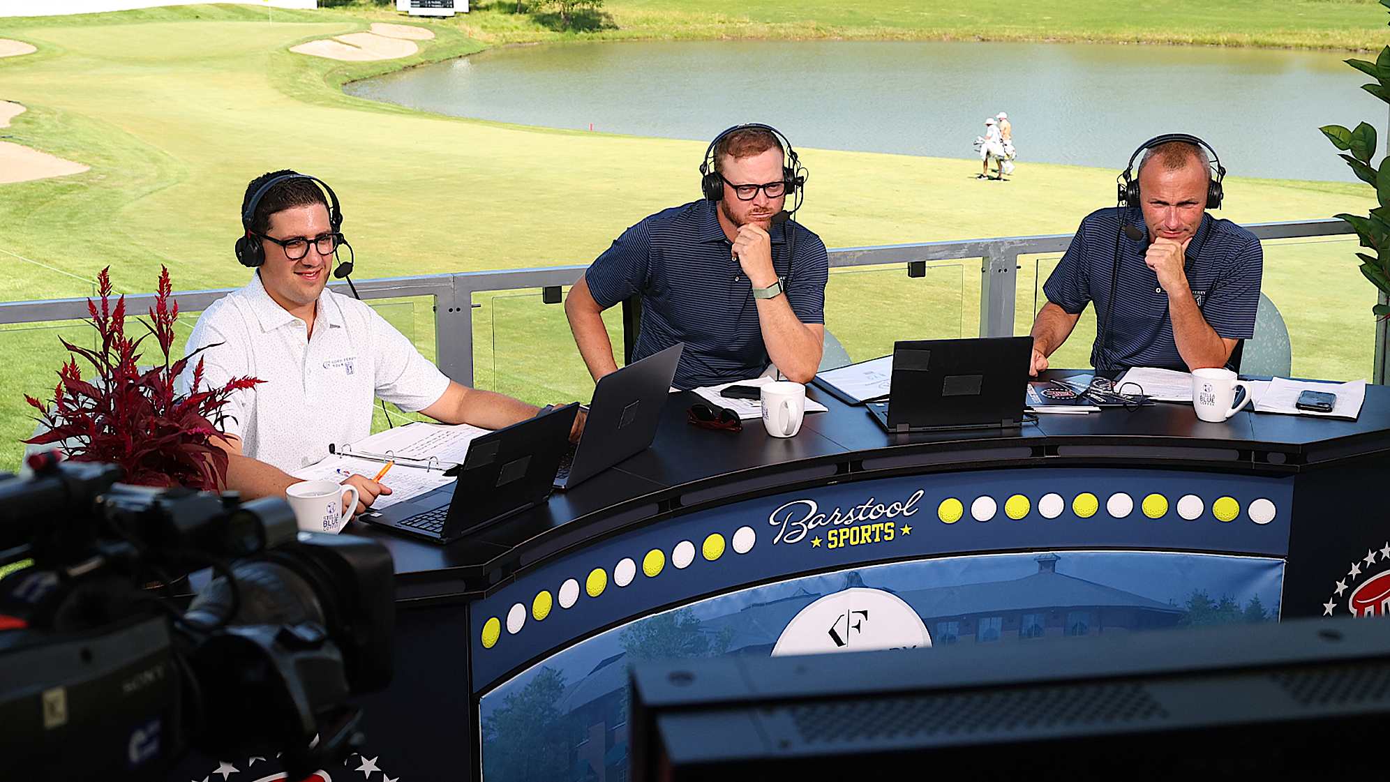 The Barstool Sports commentating team in the booth during the first round of the Korn Ferry Tour's 2023 NV5 Invitational in Glenview, Illinois. (Michael Reaves/Getty Images)