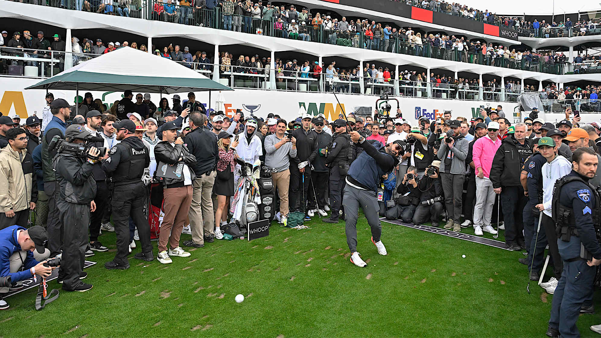 Joseph Demare, known as "Joey Cold Cuts," hits a shot on the 16th tee box prior to the 2024 WM Phoenix Open at TPC Scottsdale. (Ben Jared/PGA TOUR)