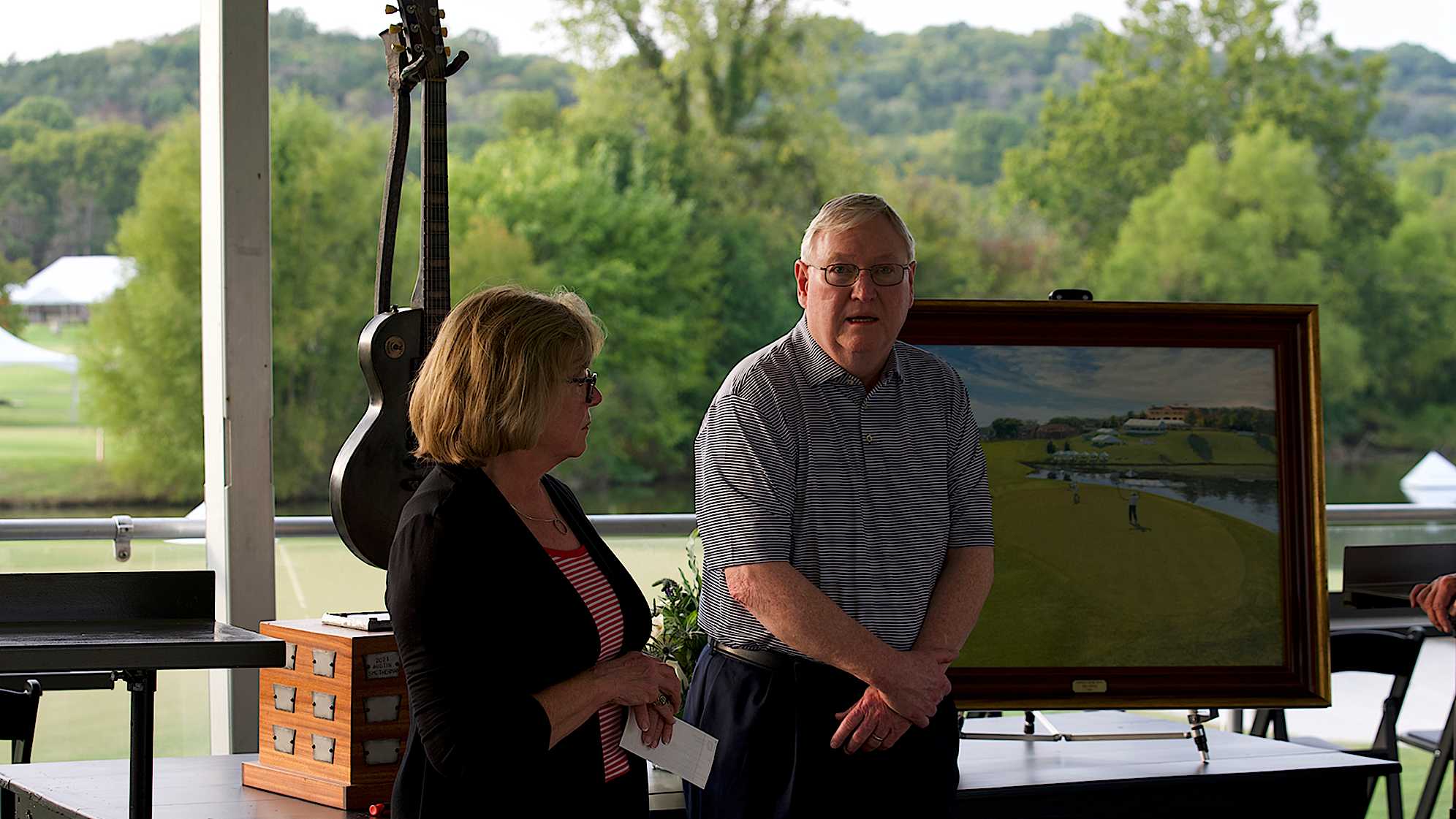 Grayson Murray's parents Eric and Terry deliver memorial words Wednesday at the Simmons Bank Open. (Dave Evenson/PGA TOUR)