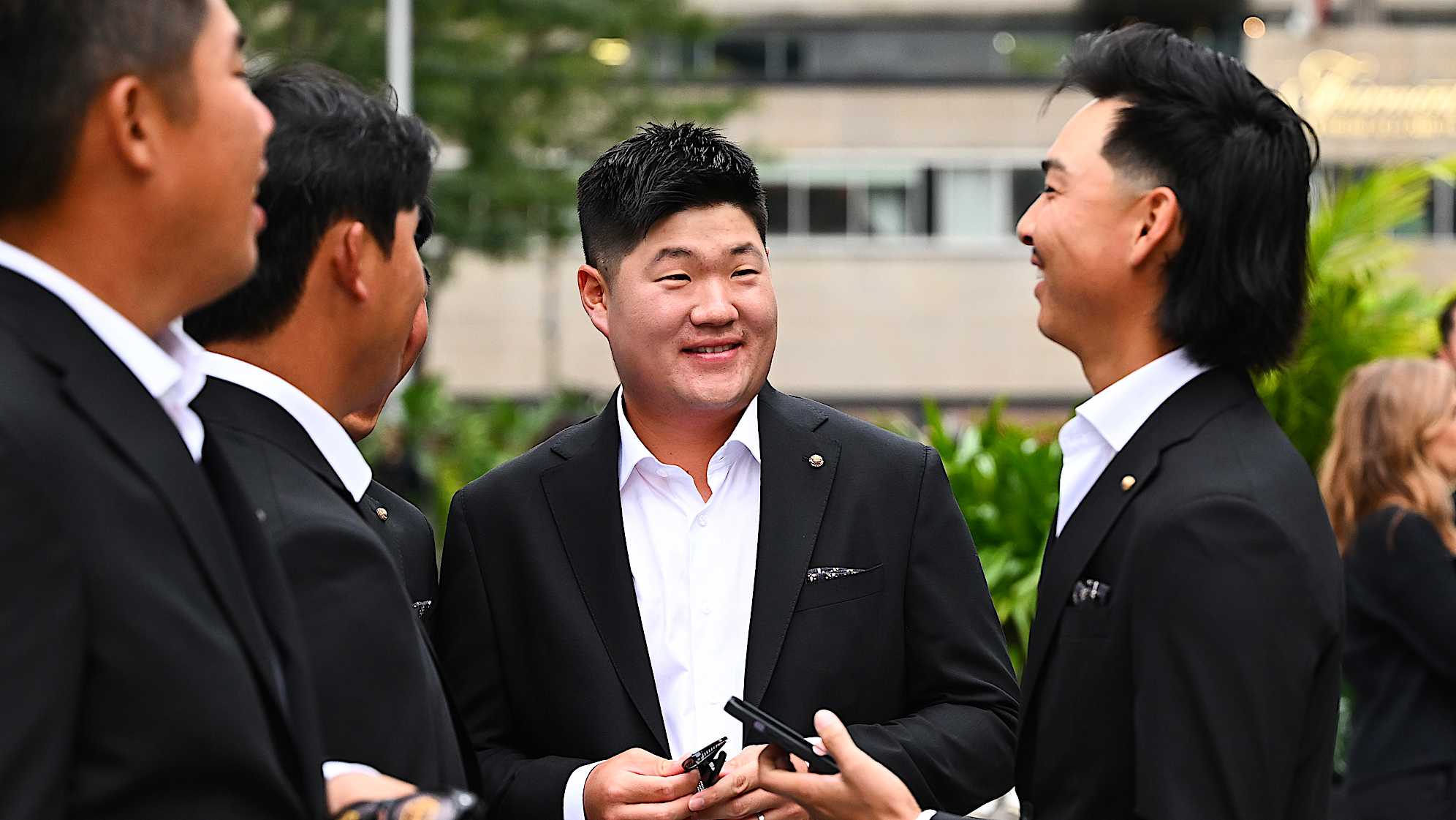 Sungjae Im of the International Team smiles at The Ring in Montreal, Quebec. (Tracy Wilcox/PGA TOUR)