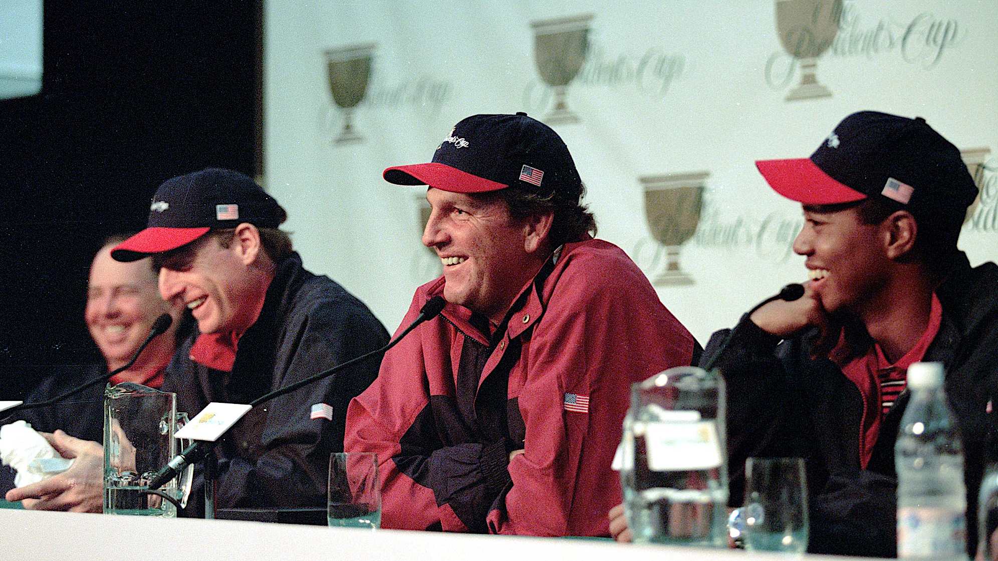 From left to right, Mark O'Meara, Jim Furyk, Mark Calcavecchia and Tiger Woods laugh during a press conference for the 1998 Presidents Cup in Melbourne. (Stan Badz/PGA TOUR)
