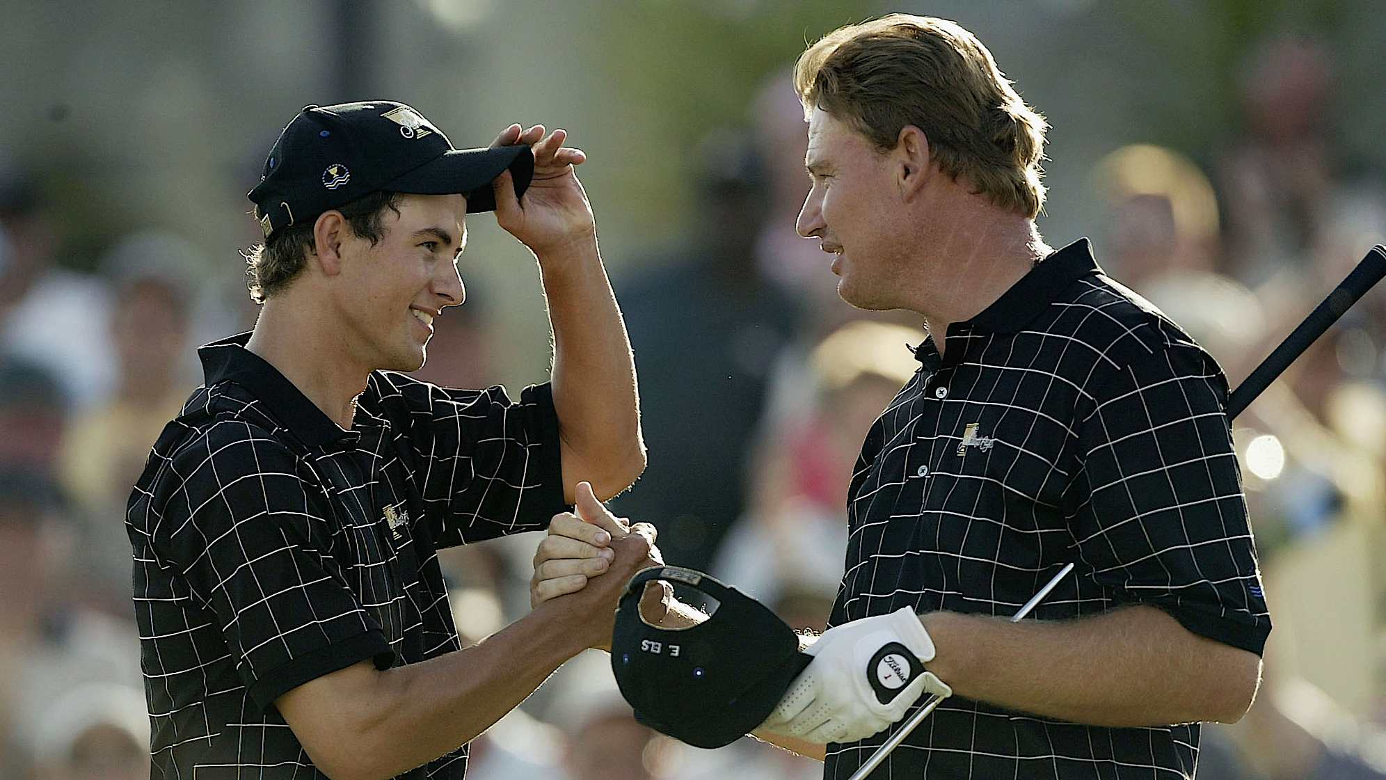 International Team members Adam Scott and Ernie Els celebrate during the 2003 Presidents Cup. (Harry How/Getty Images)