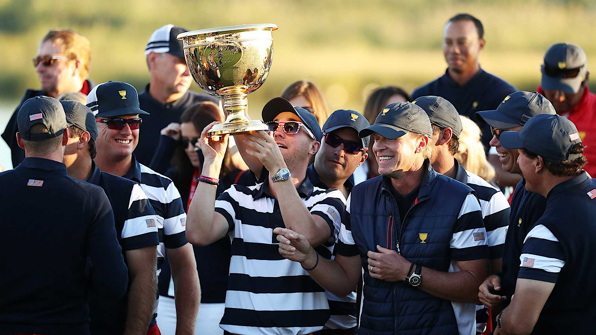 Justin Thomas of the U.S. Team celebrates with the trophy at the 2017 Presidents Cup in New Jersey. (Rob Carr/Getty Images)