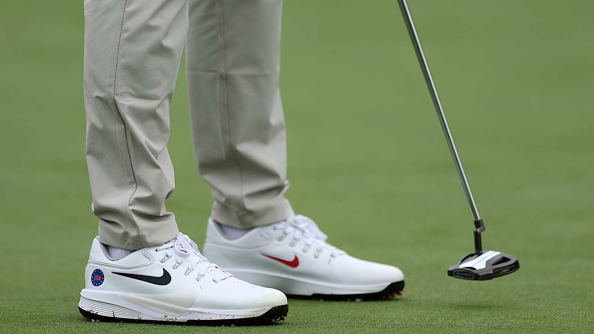 MONTREAL, QUEBEC - SEPTEMBER 25: A detailed view of the shoes worn by Scottie Scheffler of the U.S. Team on the tenth green during a practice round prior to the 2024 Presidents Cup at The Royal Montreal Golf Club on September 25, 2024 in Montreal, Quebec, Canada. (Photo by Harry How/Getty Images)