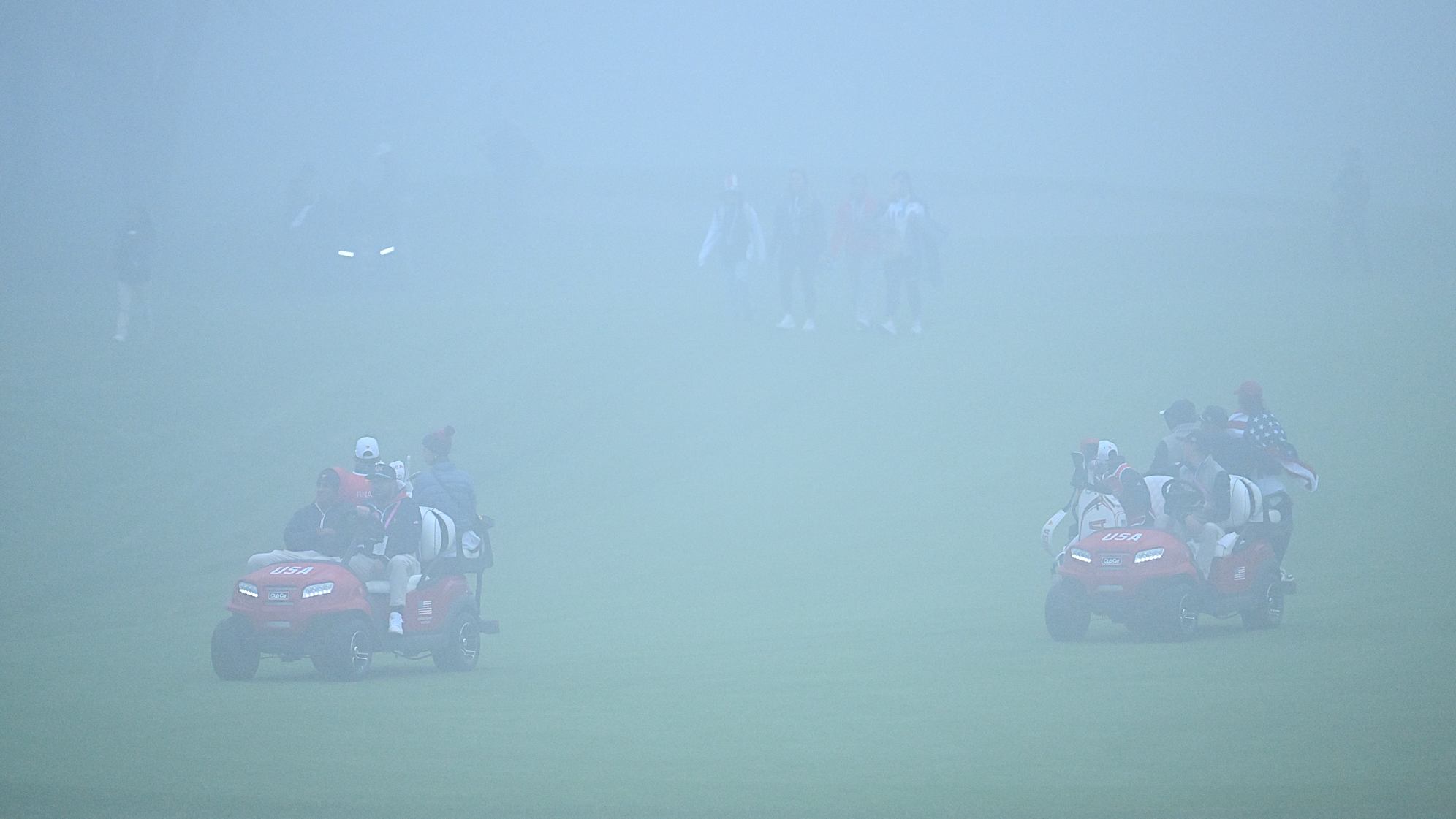 Players being driven off the course due to fog suspension on Saturday at the 2024 Presidents Cup. (Chris Condon/PGA TOUR)