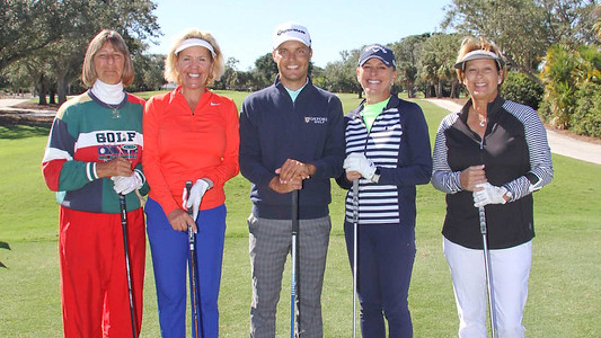 Eric Cole (middle) donated his $50,000 RSM Birdies Fore Love bonus to the McDavid Group Charities. (Credit McDavid Group Charities)
