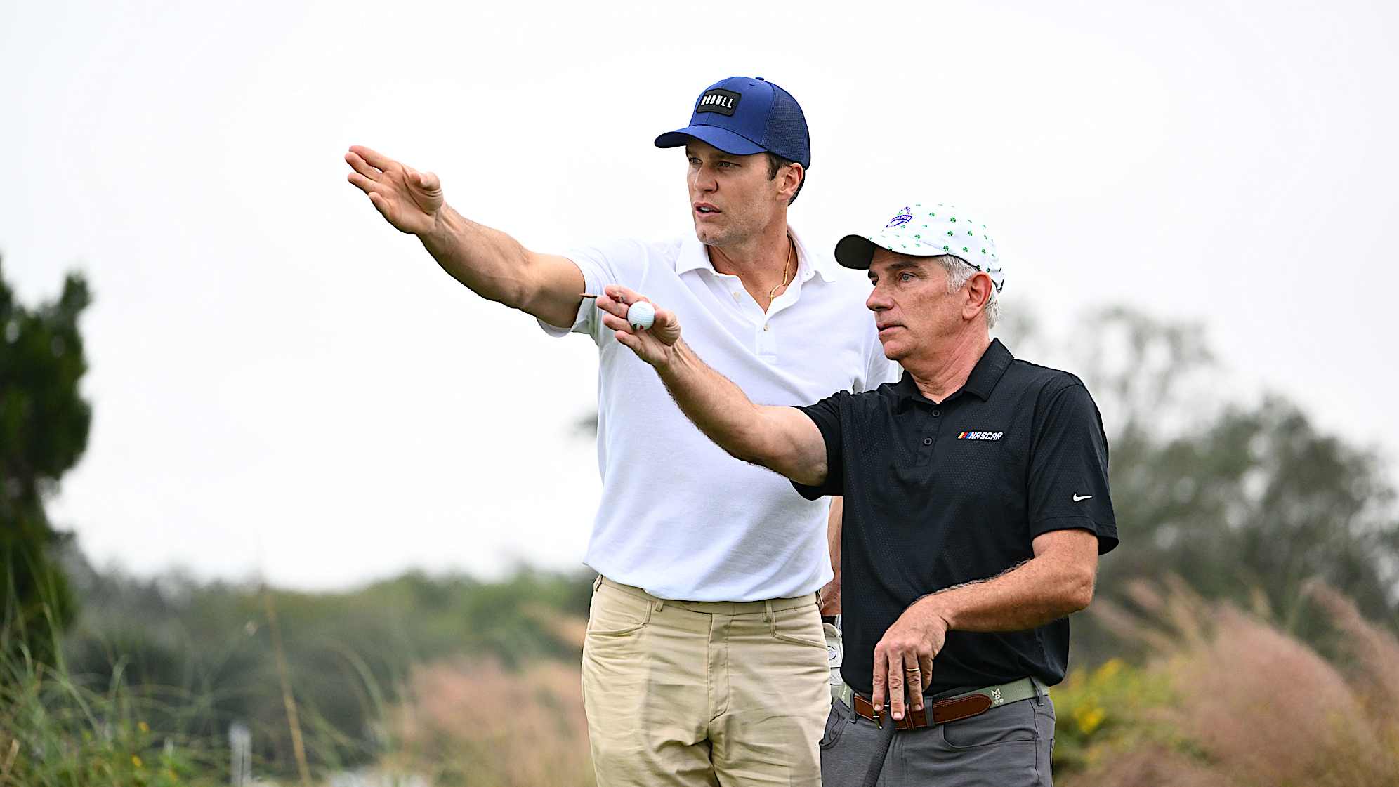Tom Brady (left) is seen during the pro-am prior to The RSM Classic. (Tracy Wilcox/PGA TOUR)