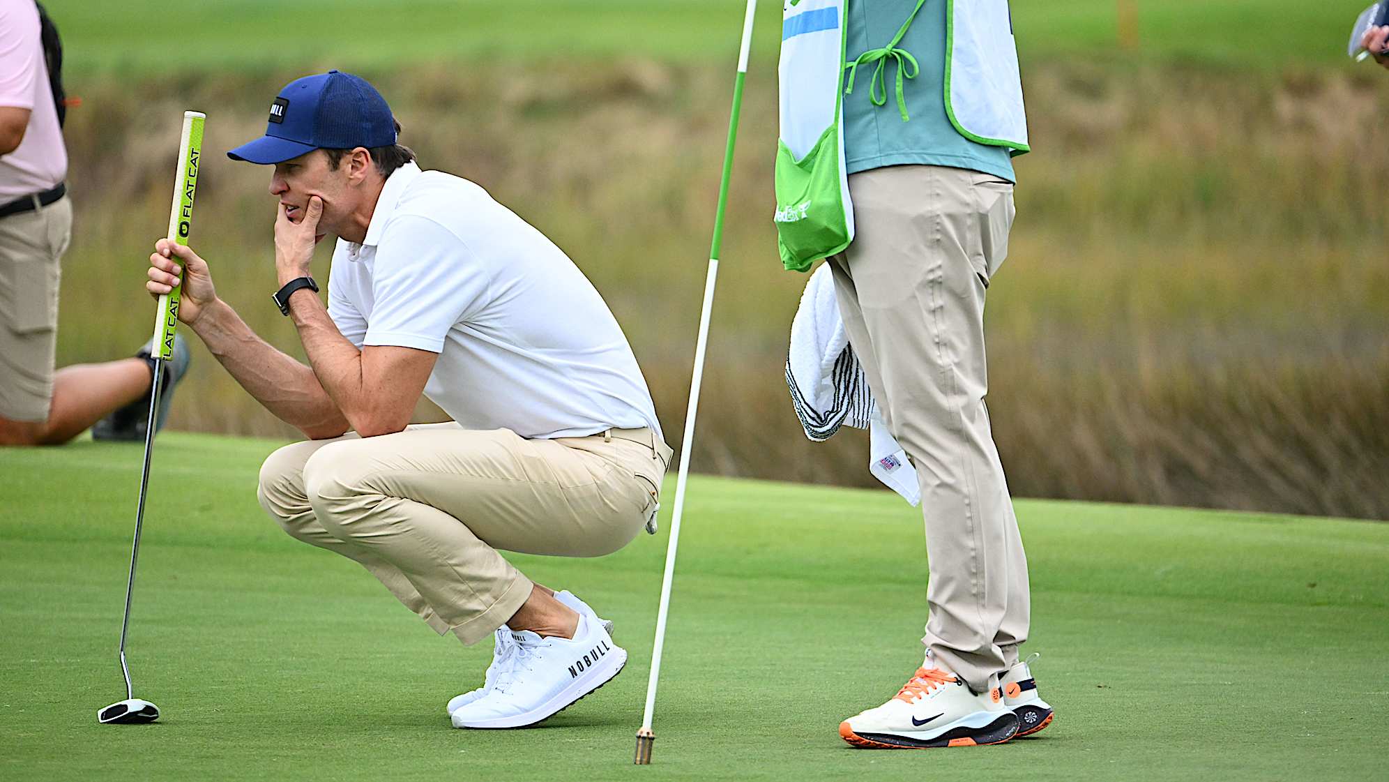Tom Brady lines up a putt during the pro-am prior to The RSM Classic. (Tracy Wilcox/PGA TOUR)