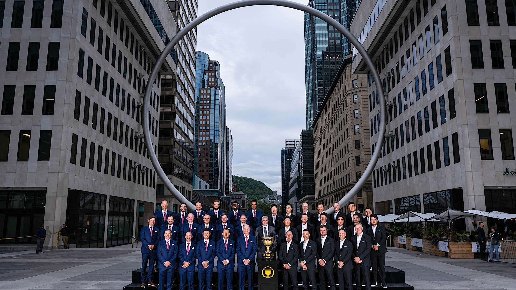 The Ring. Every time we play the Presidents Cup, we do formal team photos. Every year until this, we have done them in a ballroom with total control of the lighting and location. In Montreal it was decided to photograph the teams in front of the giant ring across the street from the host hotel. Shooting in an outdoor location (Canada in autumn) where lighting was challenging and crowd control was a factor, was really stressful. It was a solid team effort, and we made it work. The results were definitely worth it.