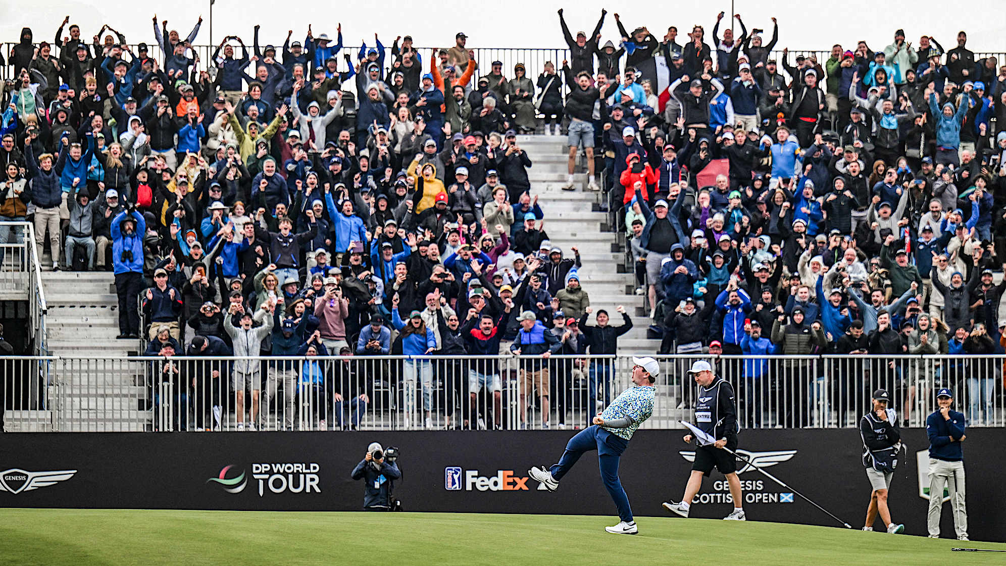 I thought it was cool to watch a popular Northern Irishman win in Scotland in 2023. Then, I got to watch a Scot win in Scotland, and that was entirely something else. I set up facing the grandstand on the final hole hoping for this scene and fortunately Robert MacIntyre, Big Shot Bob, made the putt to win his country’s Open and sent fans into a tizzy.