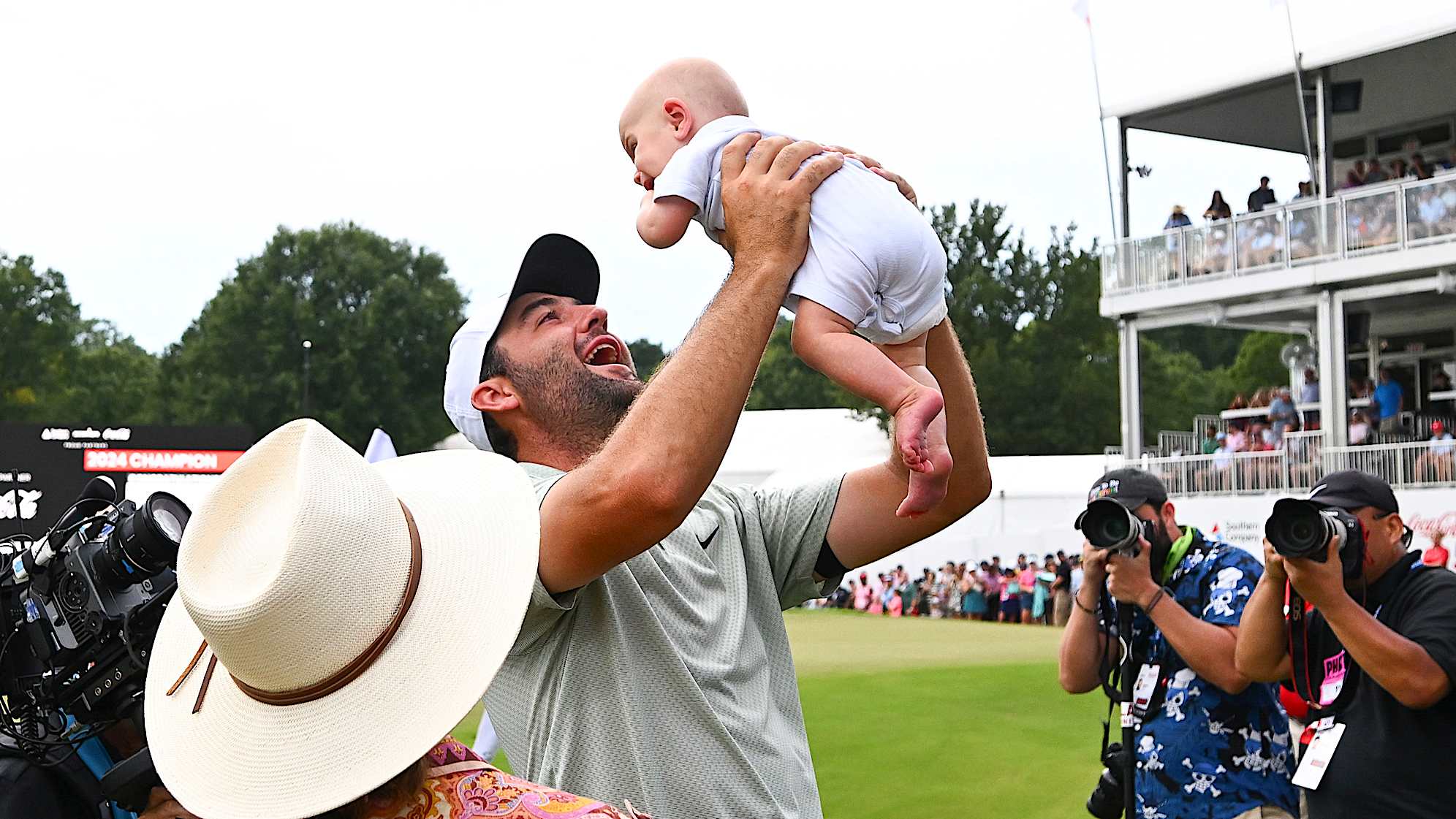 It is amazing to be able to photograph little family moments with these athletes within the field of their environment. Here, Scottie Scheffler is met by his wife Meredith and son Bennett after winning the TOUR Championship.