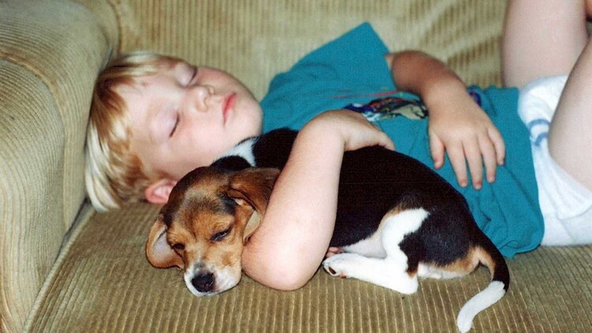 A young Grayson Murray with the Murray family dog Fred. (Credit Murray family)