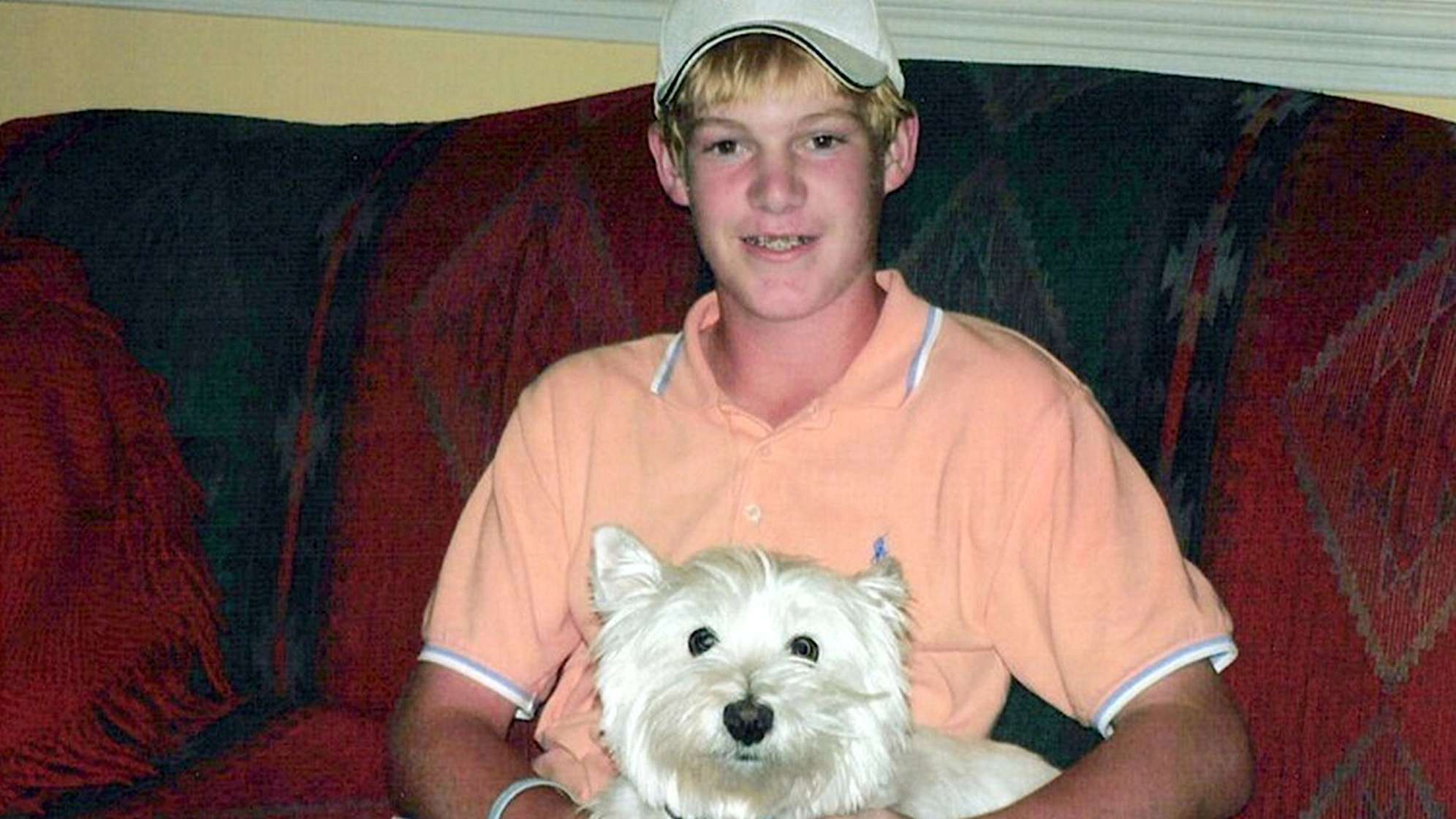 A young Grayson Murray with the Murray family dog Maggie. (Credit Murray family)