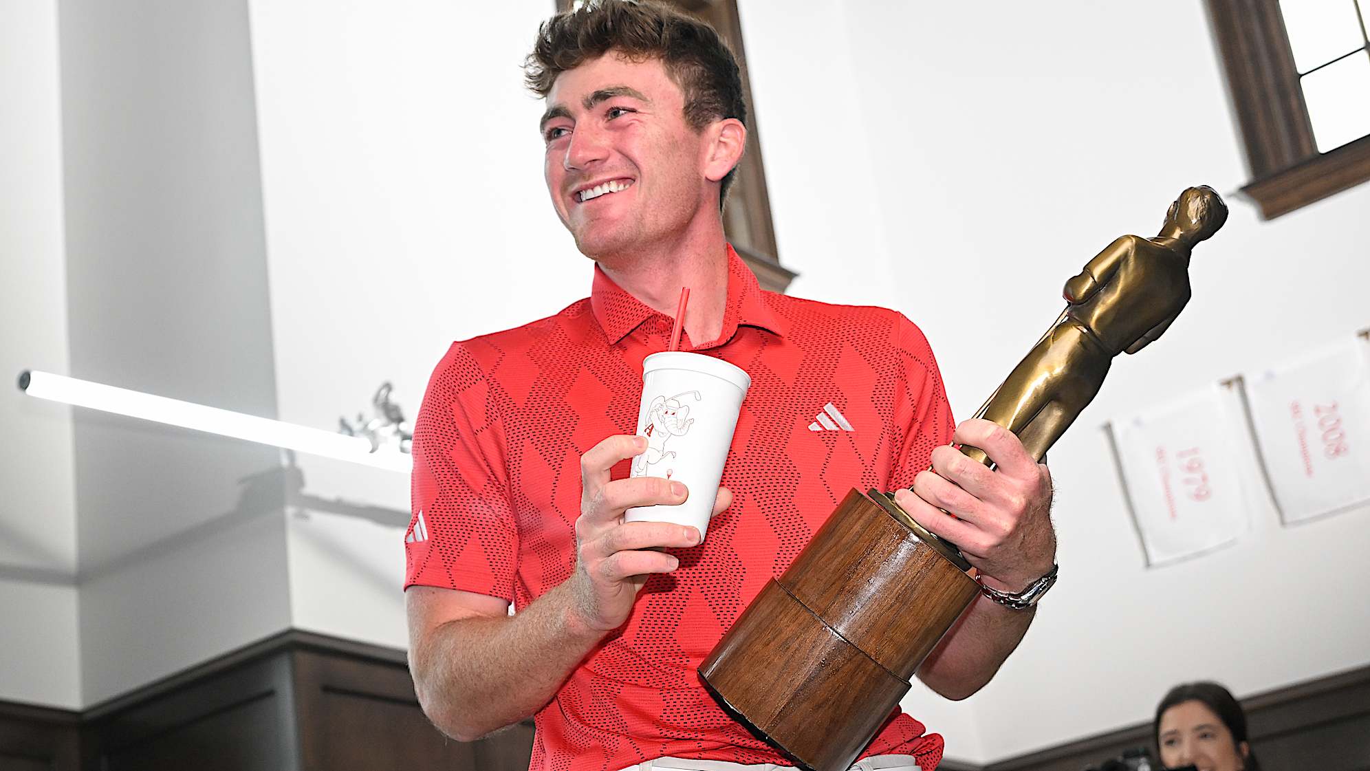 Nick Dunlap gets surprised with the Rookie of the Year trophy in Tuscaloosa, Alabama. (Ben Jared/PGA TOUR)