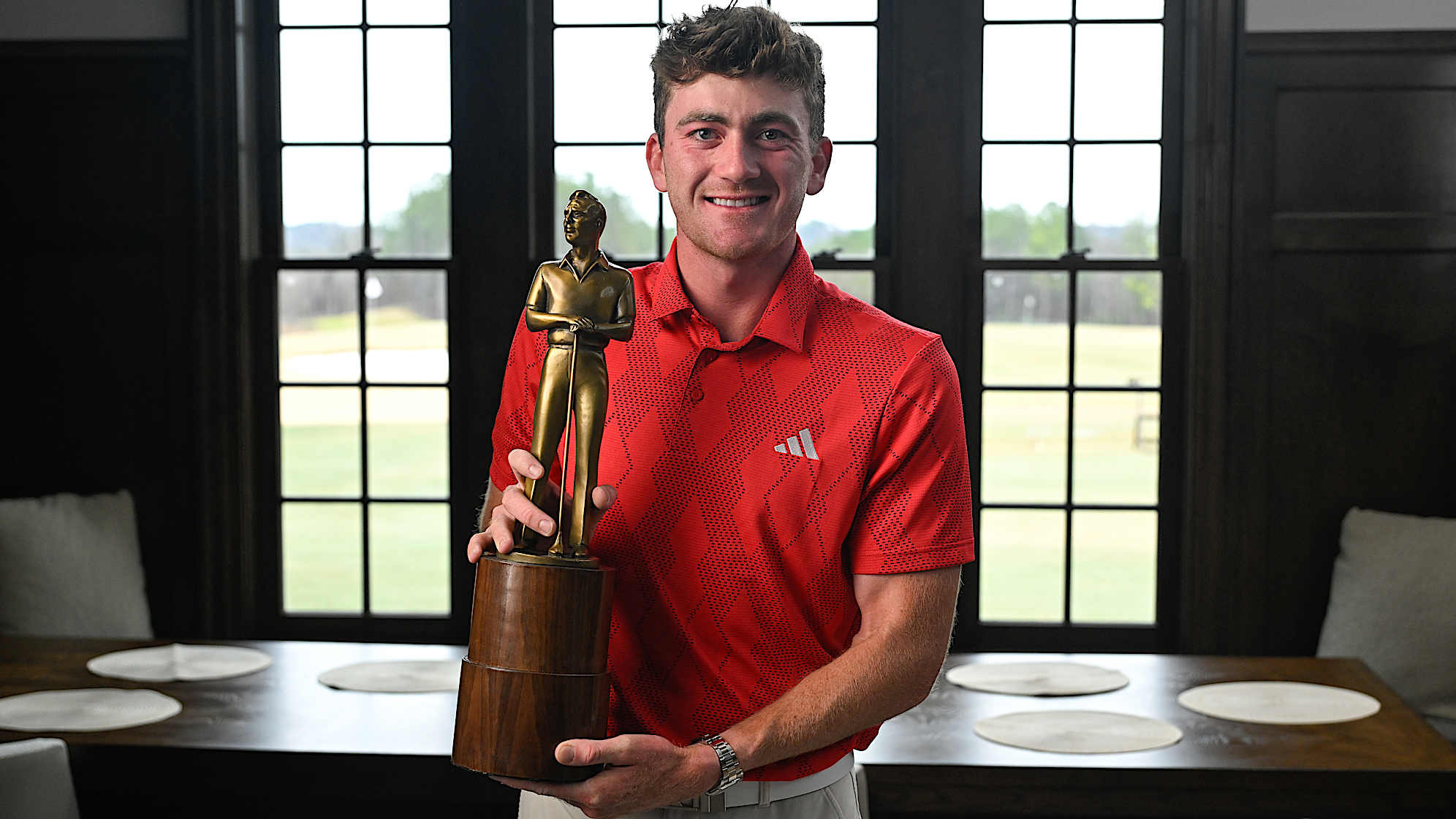 Nick Dunlap gets surprised with the Rookie of the Year trophy in Tuscaloosa, Alabama. (Ben Jared/PGA TOUR)