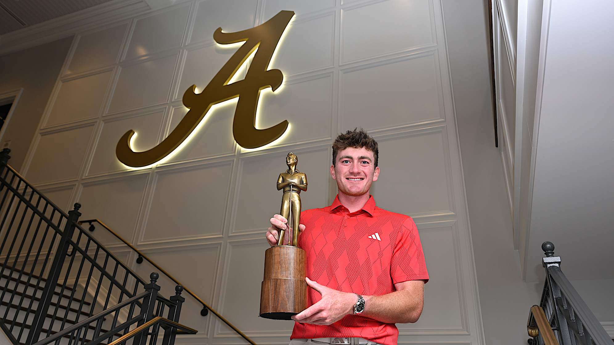 Nick Dunlap gets surprised with the Rookie of the Year trophy in Tuscaloosa, Alabama. (Ben Jared/PGA TOUR)