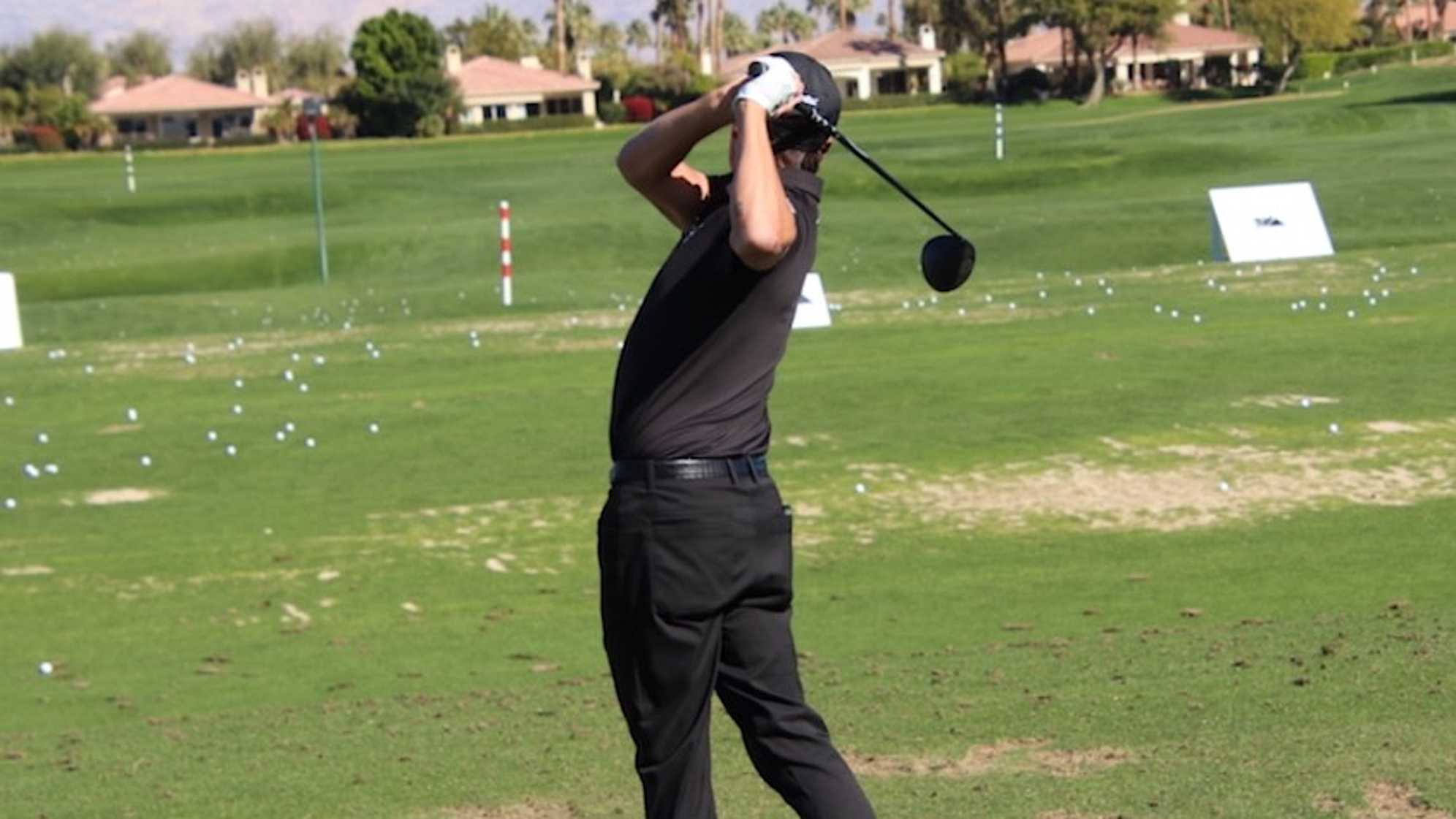 Rickie Fowler testing the new prototype Cobra 2-wood. (GolfWRX)
