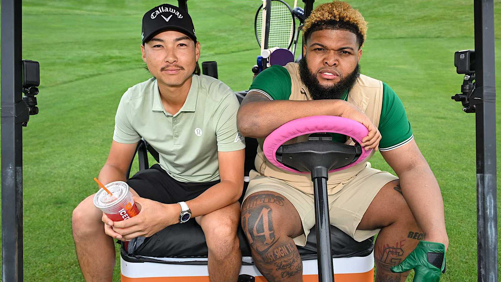 Druski (right) and Min Woo Lee are seen participating in "Truth or Putt." (Credit PGA TOUR) 