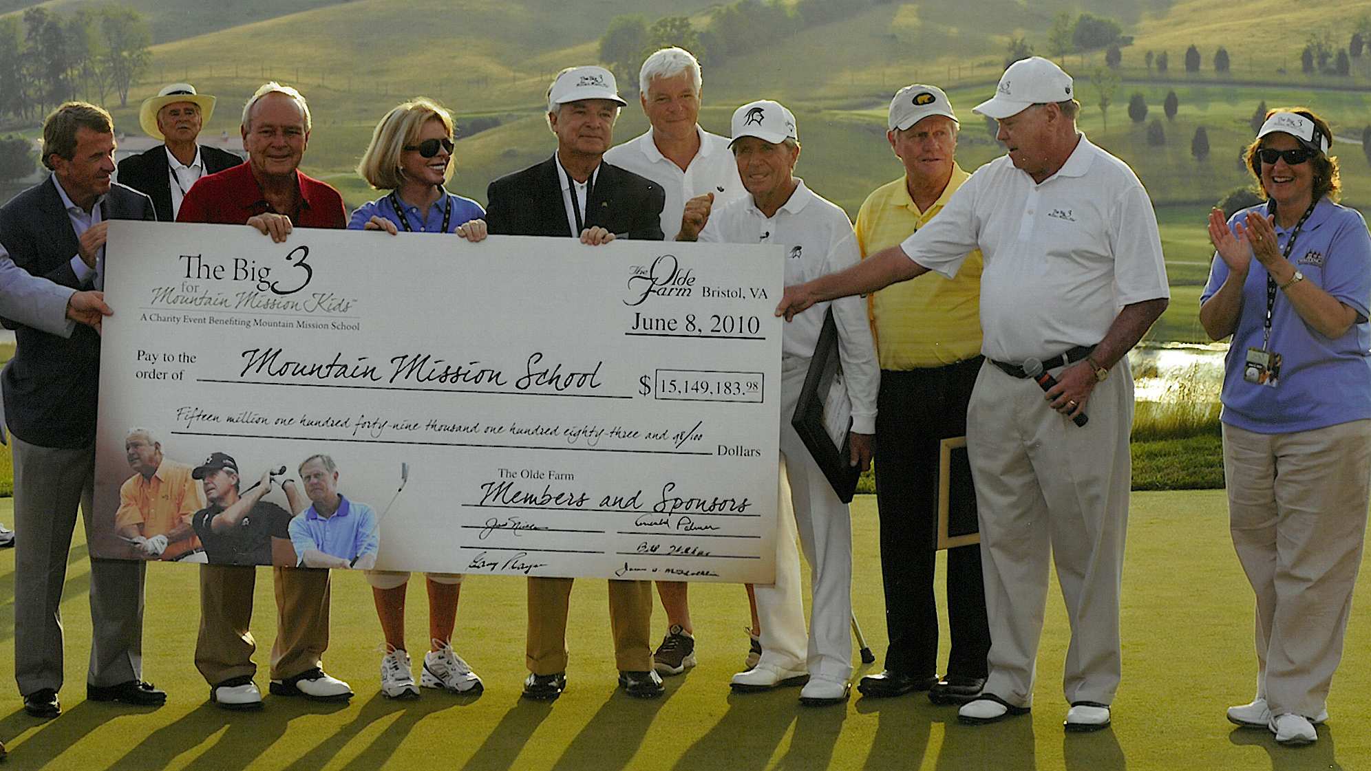 Jim McGlothlin (second from right) presents the donation of over $15 million to the Mountain Mission School at "The Big 3" charity golf event at The Olde Farm in 2010. (Credit The Olde Farm Golf Club)