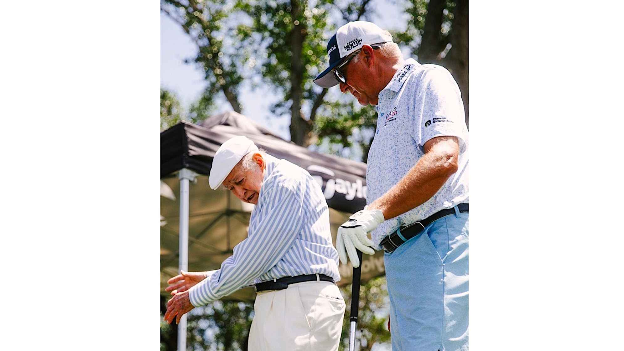PGA of America Hall of Famer Bob Toski demonstrates a back swing during a lesson with PGA Tour Champions winner Ken Duke. (Courtesy of Ken Duke)