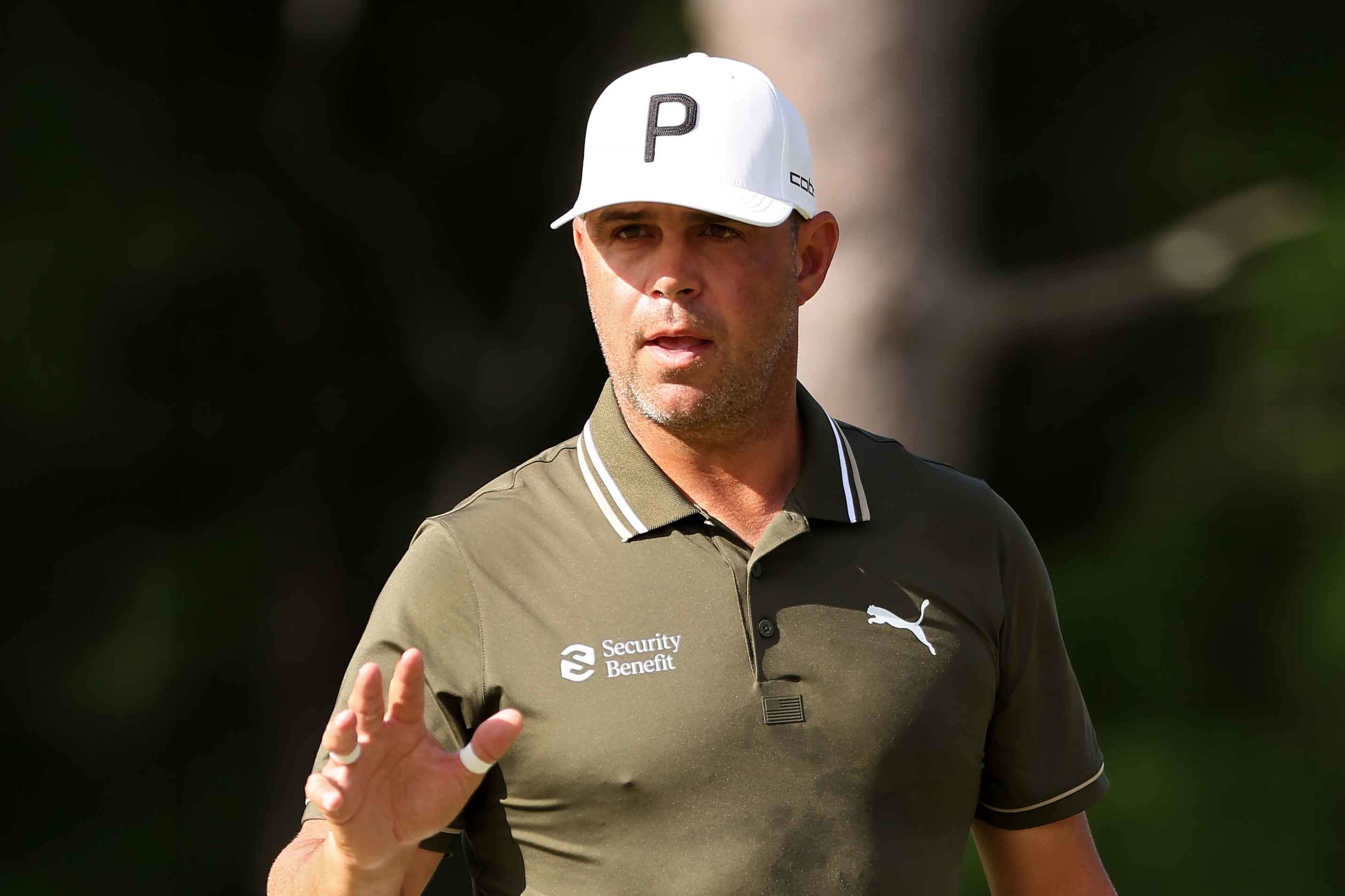 Woodland surges to lead in Houston shortly after revealing PTSD diagnosis