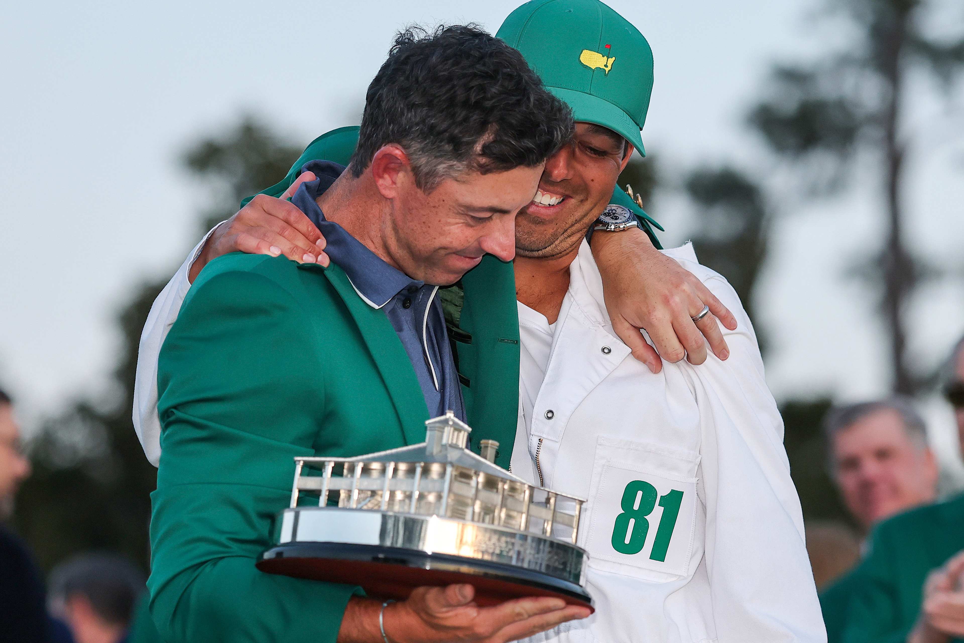 McIlroy sheds burden of winning green jacket. Now it falls to others