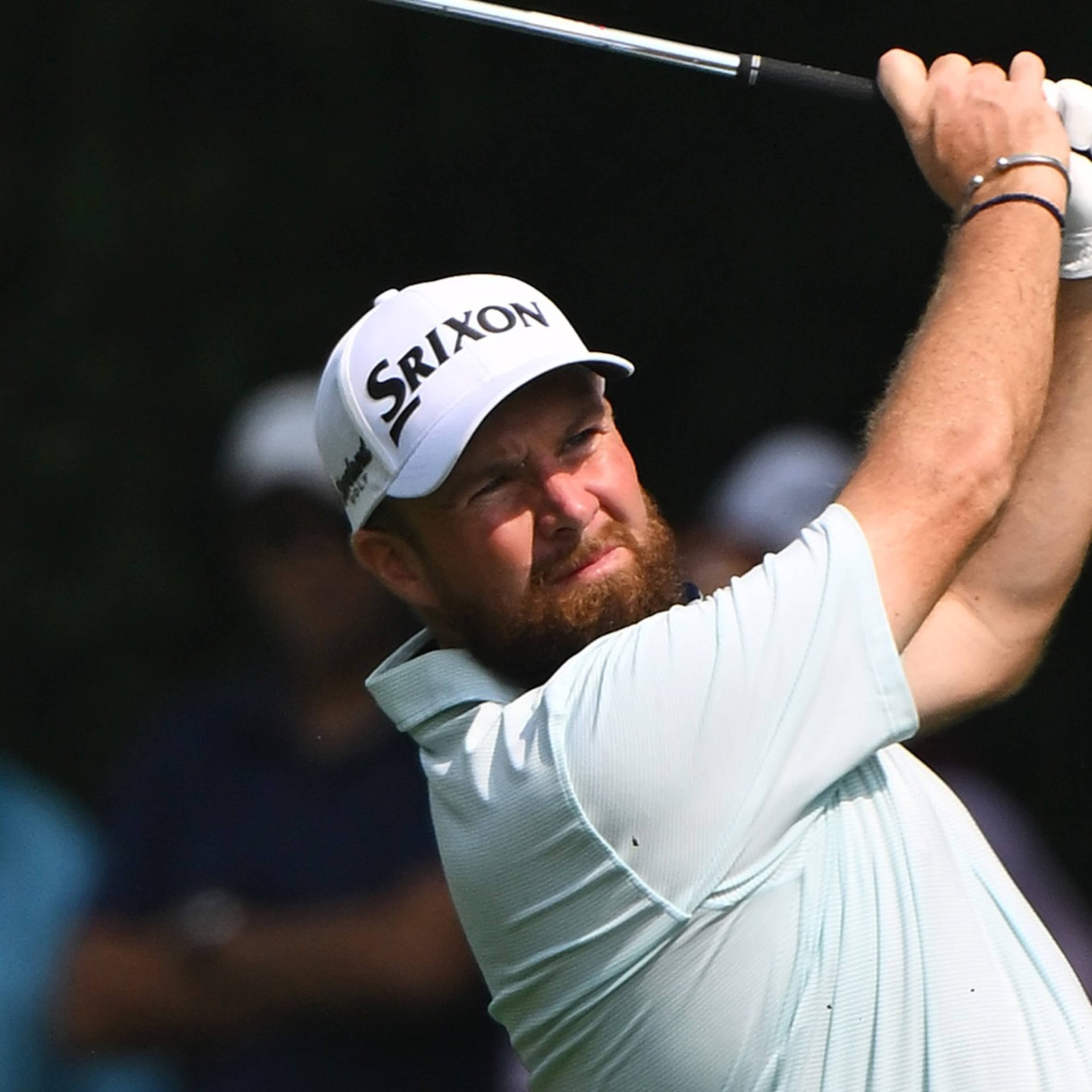 Lowry leads in India with 64, McIlroy leaves driver out of bag to shoot 69