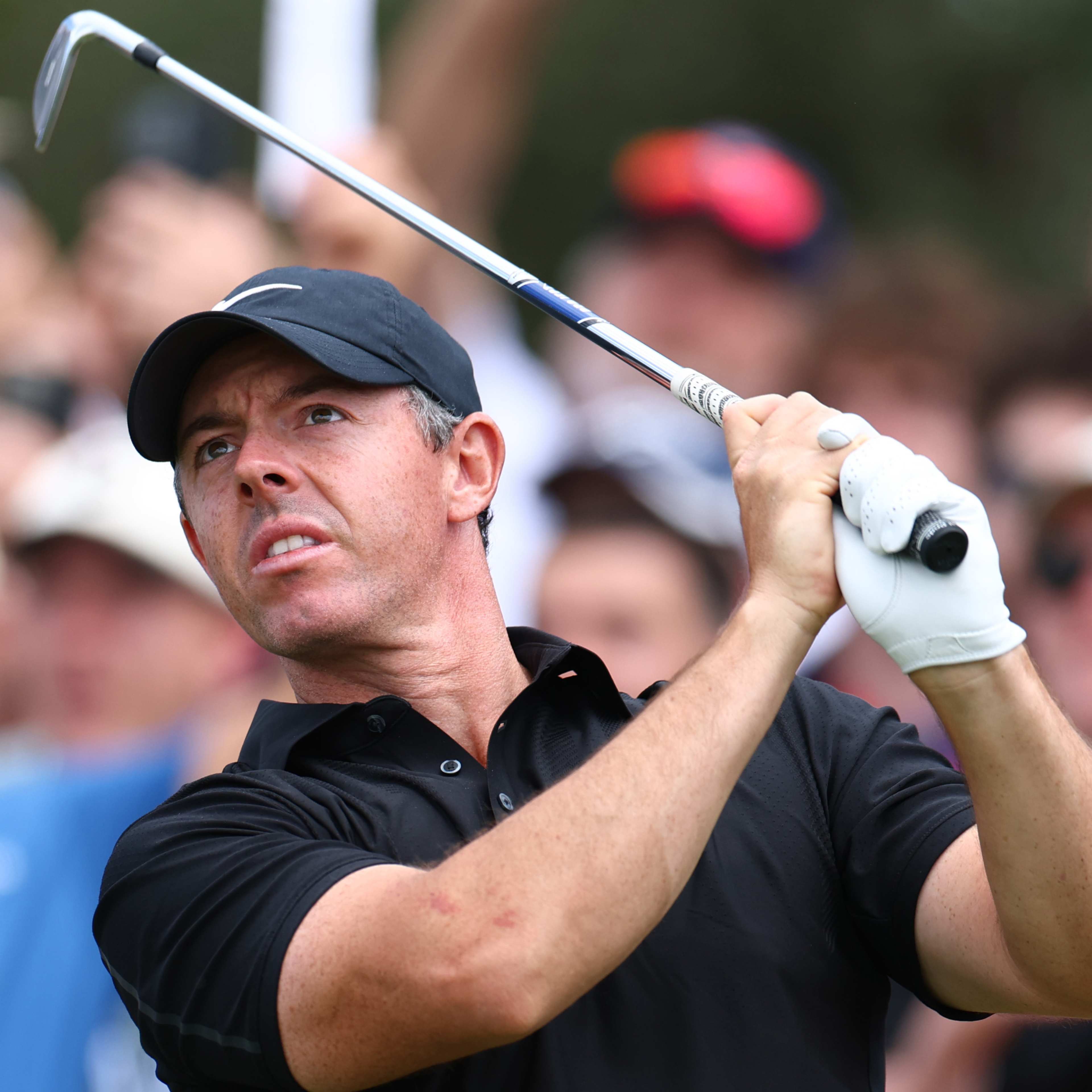 McIlroy's late birdie burst means he'll be playing on the weekend at Australian Open