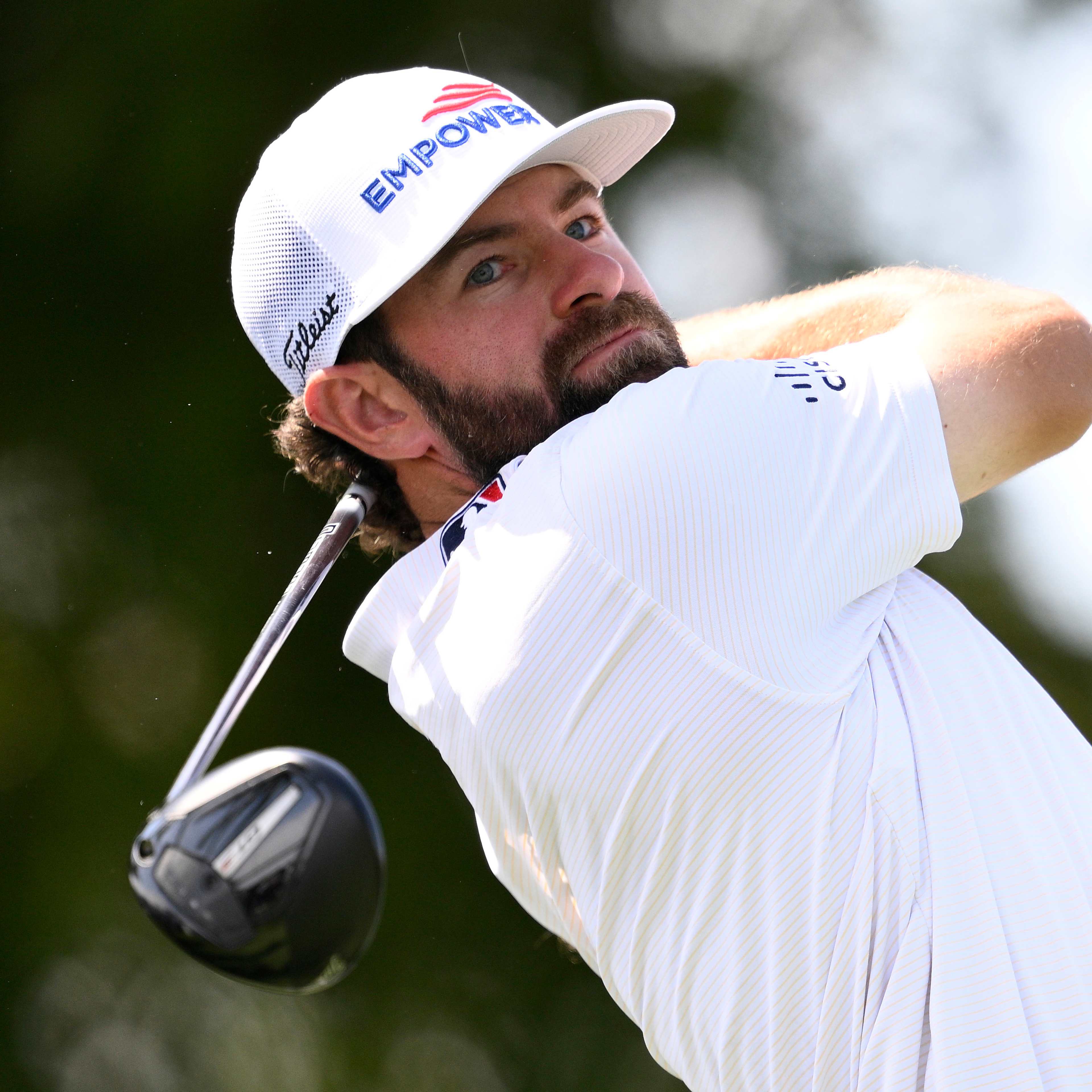 Young makes big putts to take early lead at Cadillac Championship