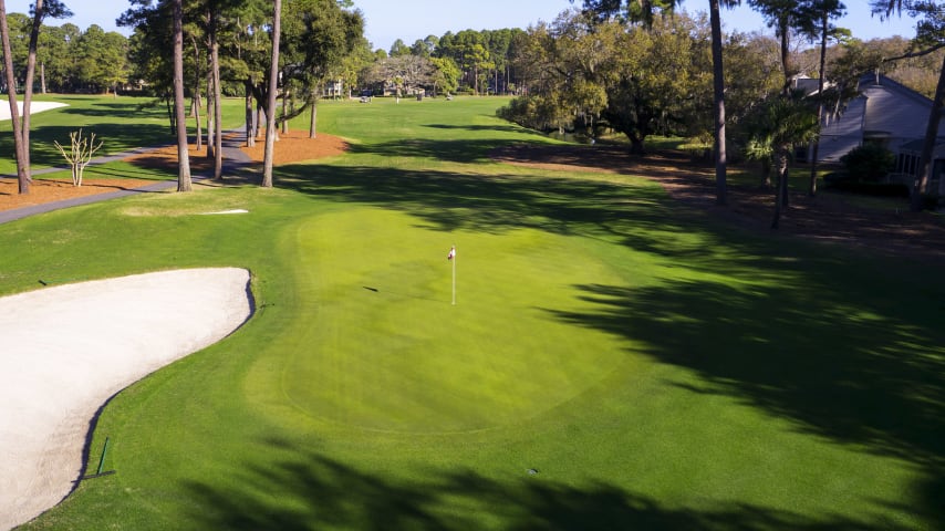 A wide landing area invites a big drive, but temper your gusto if you want to avoid the lagoon on the left. After a good drive, use a medium or long iron to get to a green nestled between woods and two strategically-placed bunkers.