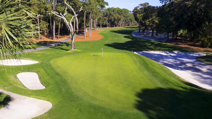 Plot your drive to stay within the chute, because a dangerous duo of trees and water lurks on both sides of the fairway. From the fairway, a long to medium iron must be rifled to the green, carefully avoiding the tree gracefully protecting the right side. The green is also flanked by bunkers.