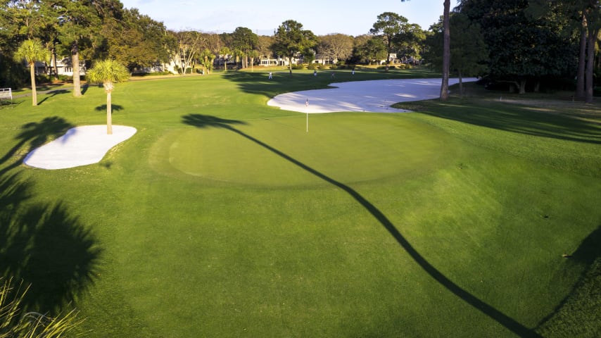 The exclamation point of sand just about says it all on this interesting dogleg left. Avoid the left. But also beware the slalom-like pines to the right. If you arrive unscathed after that first drive, it's just a short iron to the green. Aim carefully. The cluster of bunkers to the right can easily humiliate par-seekers.