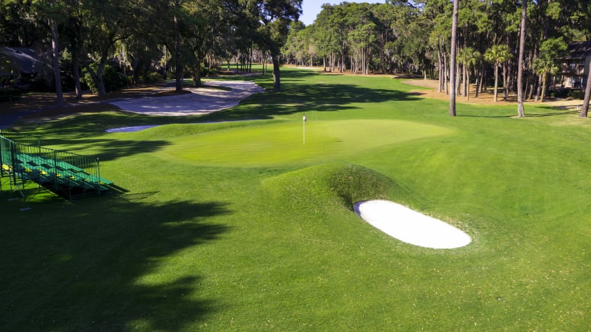 Long hitters can reach the green in two if they keep the drive on the left side of the fairway. Otherwise, the second shot should be positioned down the left side to open up the green, which lies on a diagonal, for the third shot.
