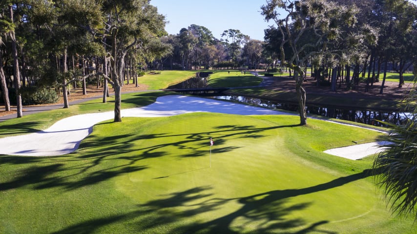 The green is surrounded by sand, but the real hazards here are the trees. They will reject any off-line shot and make a successful recovery very tricky. The green is narrow but deep, and pin placement can impact club selection.