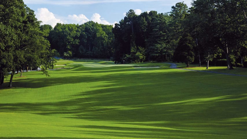 This long par 4 requires a strong tee shot near the right edge of the fairway. A steep shoulder with mounds along the left edge of the green will challenge approaches from the left side.