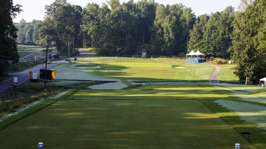 This long par 3 requires a well struck long iron or wood to a large tow tier green guarded on the front right and left by deep bunkers.