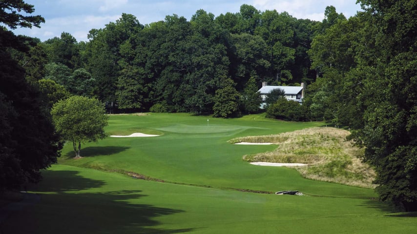 The most challenging hole on the course requires a tee shot left of center and near the creek - the difficult uphill approach to a large undulating green in a natural amphitheater setting.