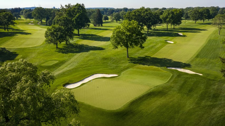 A well hit tee shot will take advantage of a slope in the fairway at the 275-yard mark leaving the player with a short shot into a receptive green. Two bunkers line the right side of the fairway: the first at 280, the second at 330. A miss left or long of the green will roll away significantly due to the tightly mown run-off area. (Source: PGA of America)