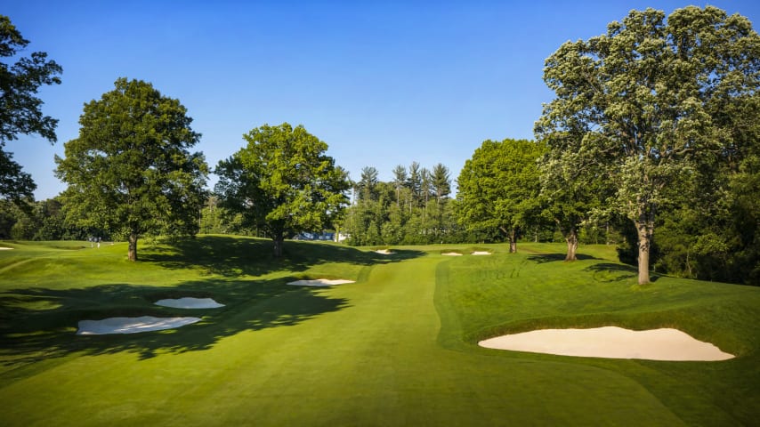 A precise tee shot is needed on this short par 4 due to the severely narrow fairway and deep fairway bunkers on both sides. The elevated green slopes severely from back to front. An approach shot below the hole gives the player the best chance for a birdie. (Source: PGA of America)