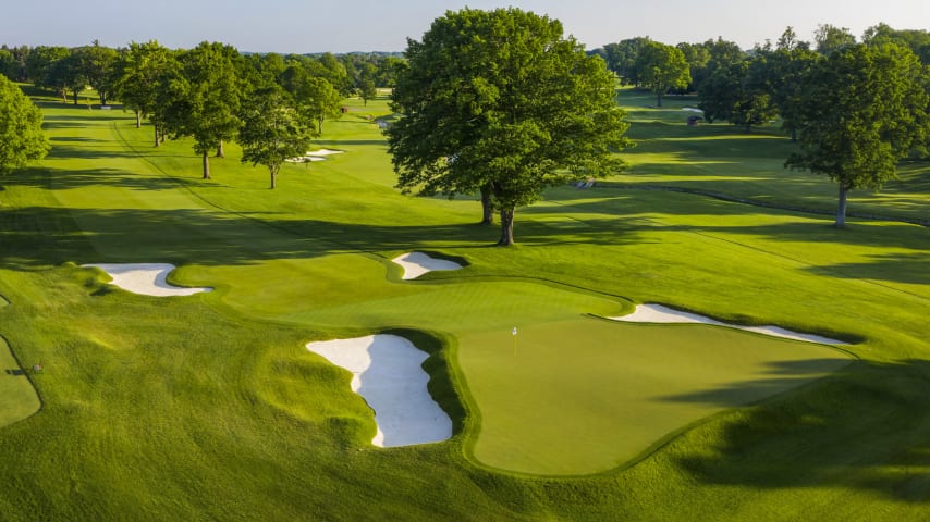 A two-tiered green surrounded by four deep bunkers requires an accurate tee shot to have a chance at birdie. A shot that misses long will make it very challenging to save par. When planning an approach, pay attention to the hole location to ensure the best chances for a scoring opportunity. (Source: PGA of America)