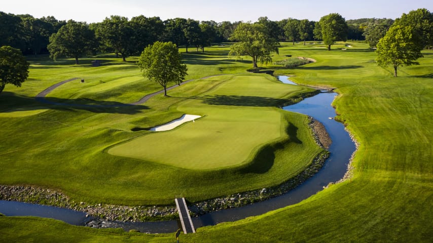 This long par 4 doglegs slightly to the right, with fairway bunkers on the left and water up the right. An exacting tee shot is a must to have a chance at hitting this green in regulation. Allens Creek meanders across the fairway and protects long and left of this multi-tiered green complex. A thoughtful approach shot depending on the hole location is needed for any opportunity for a birdie. (Source: PGA of America)