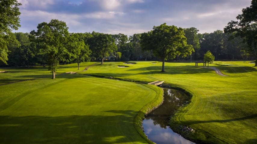 With Allens Creek winding up the right side of the hole then crossing the fairway, plus a thick strand of trees left, this tee shot must be carefully placed. Many players may use a fairway wood or long iron to ensure safety off the tee. The approach shot is uphill to one of the most challenging greens on the course. (Source: PGA of America)